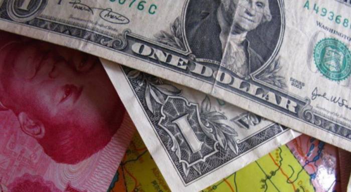 Stable Yuan Rises Amid Dollar Surge, US Capital in Disarray